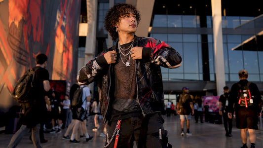 Gamer adjusting streetwear jacket at convention