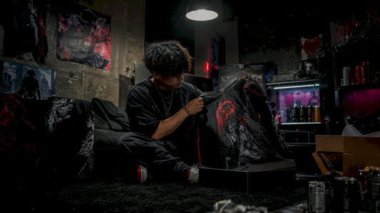 Gamer examining limited-edition streetwear hoodie