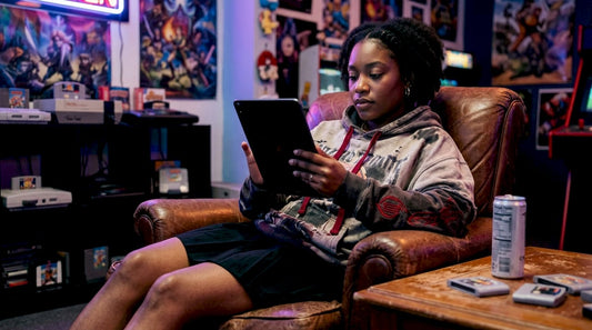 Young woman browsing gaming apparel on tablet